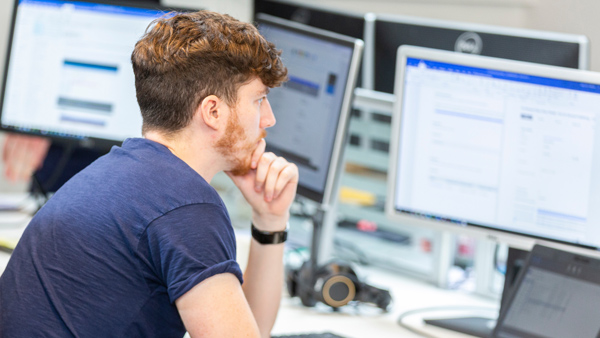 Guy working at desk